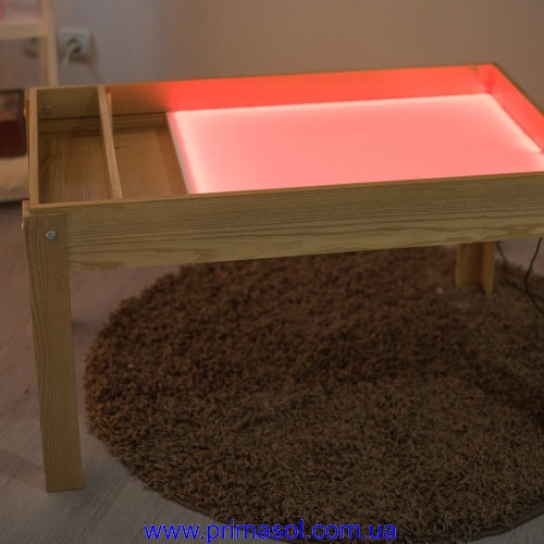Table sandbox from a natural tree an alder