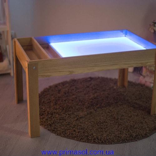 Table sandbox from a natural tree an alder