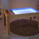 Table sandbox from a natural tree an alder